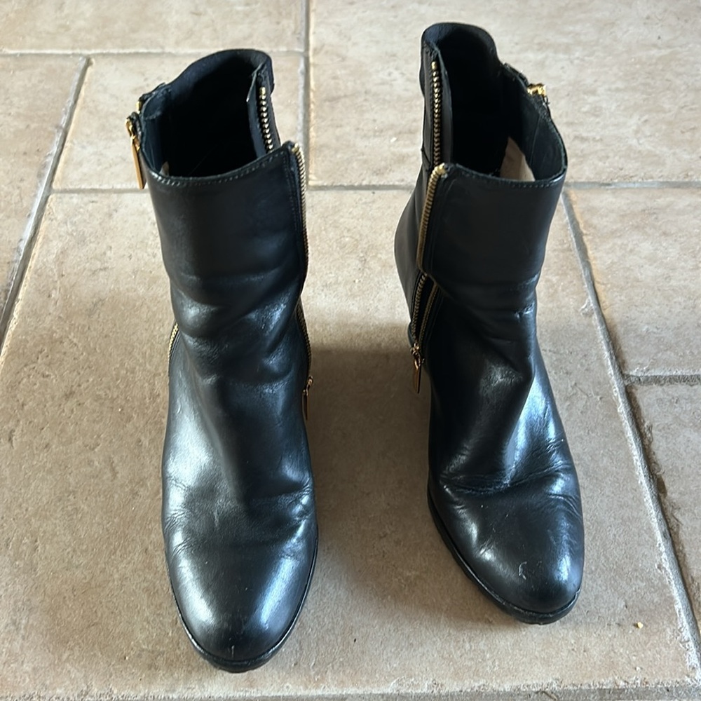 Women’s blackck Michael Kors wedge booties 
Size 7M 
Like new